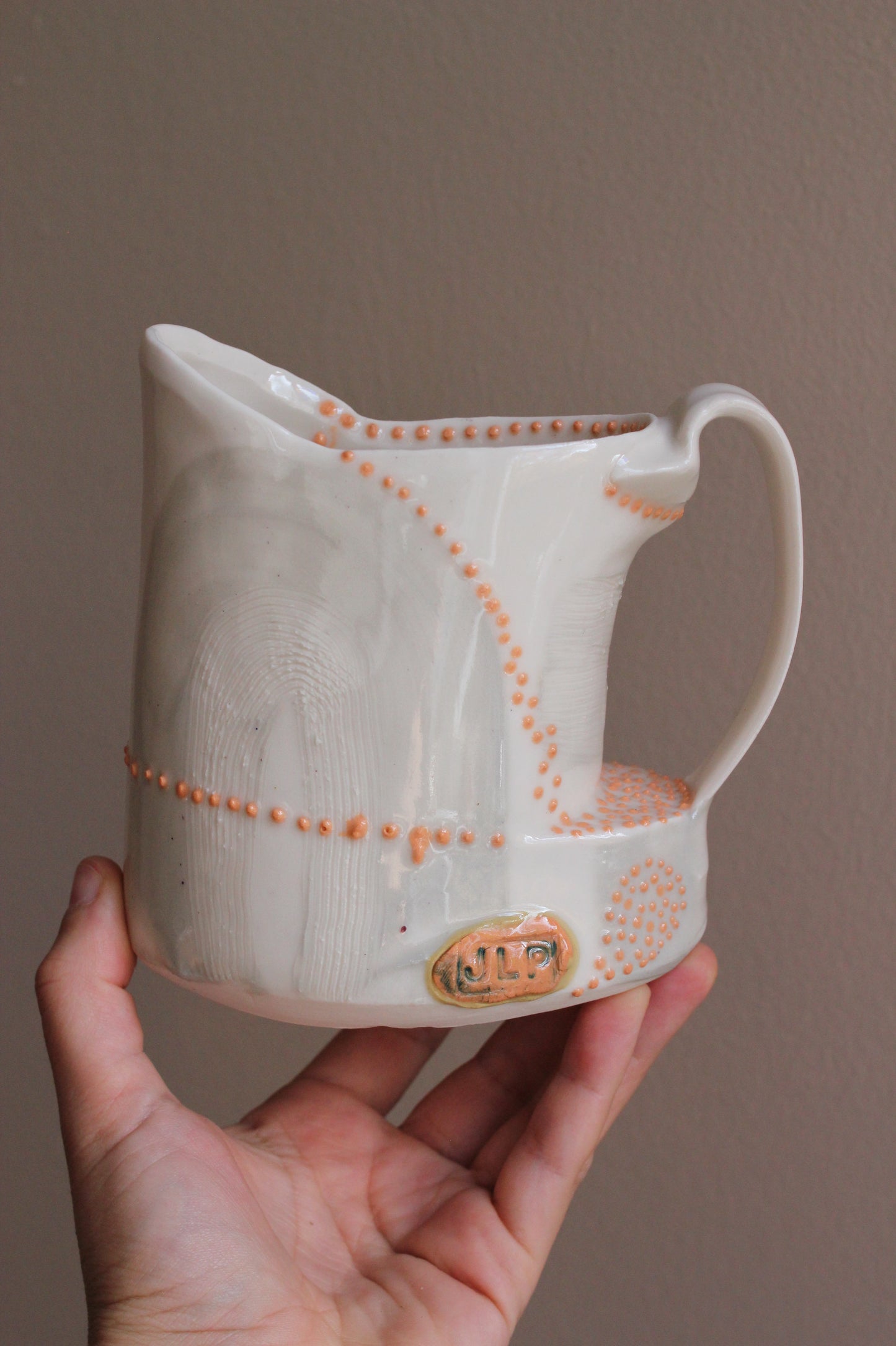 Pitcher with Gray and Orange Accents