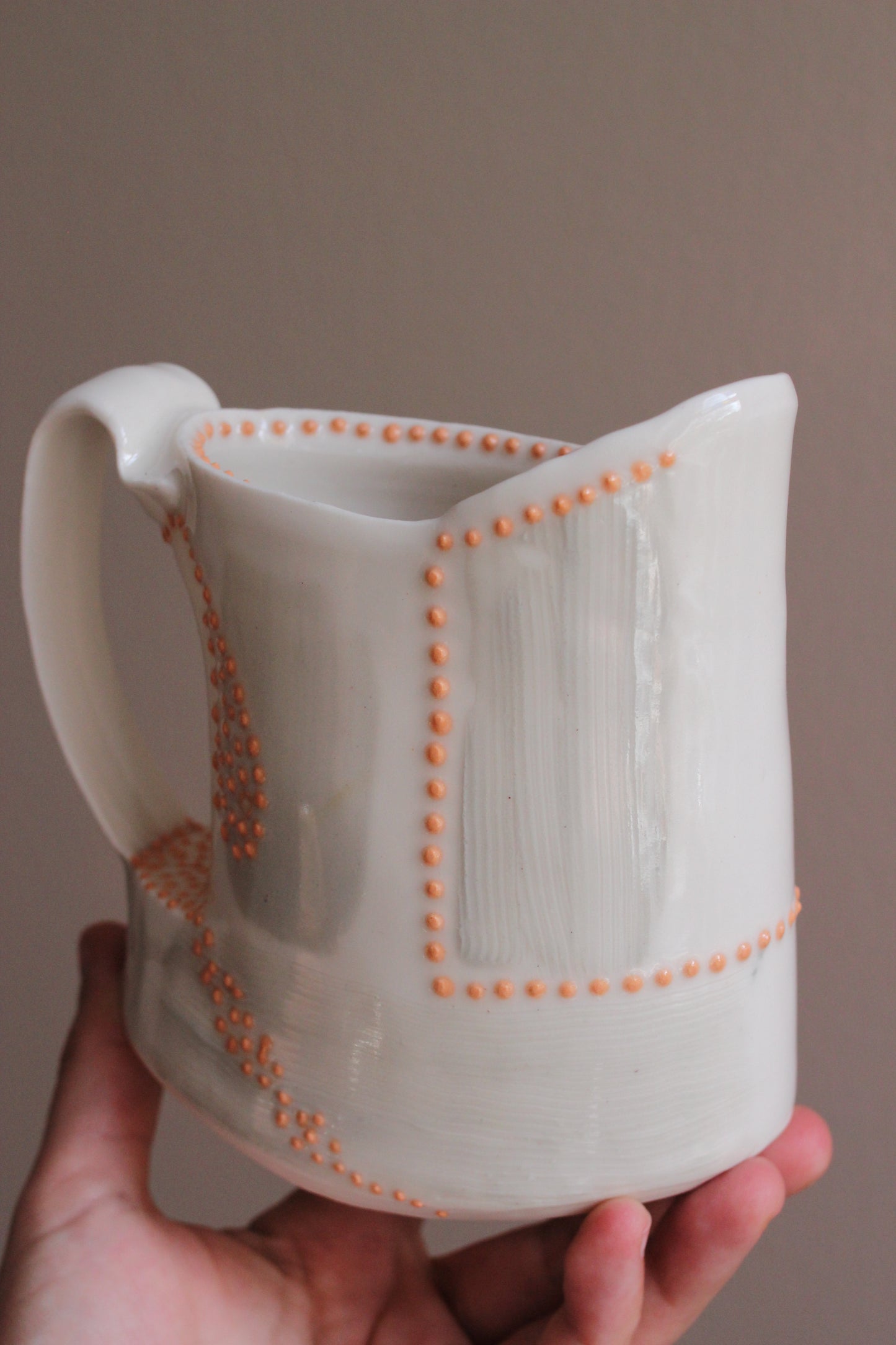 Pitcher with Gray and Orange Accents