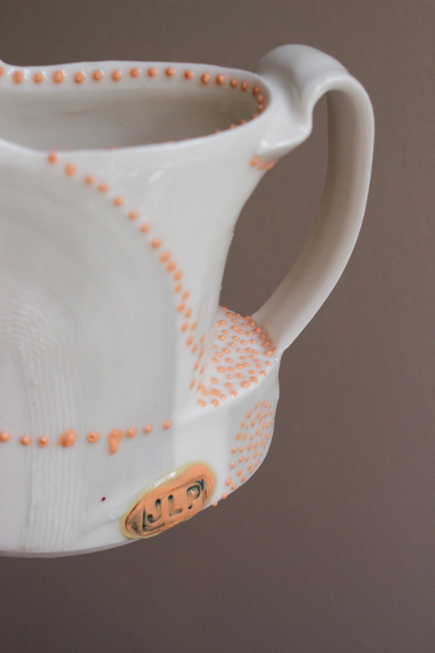 Pitcher with Gray and Orange Accents