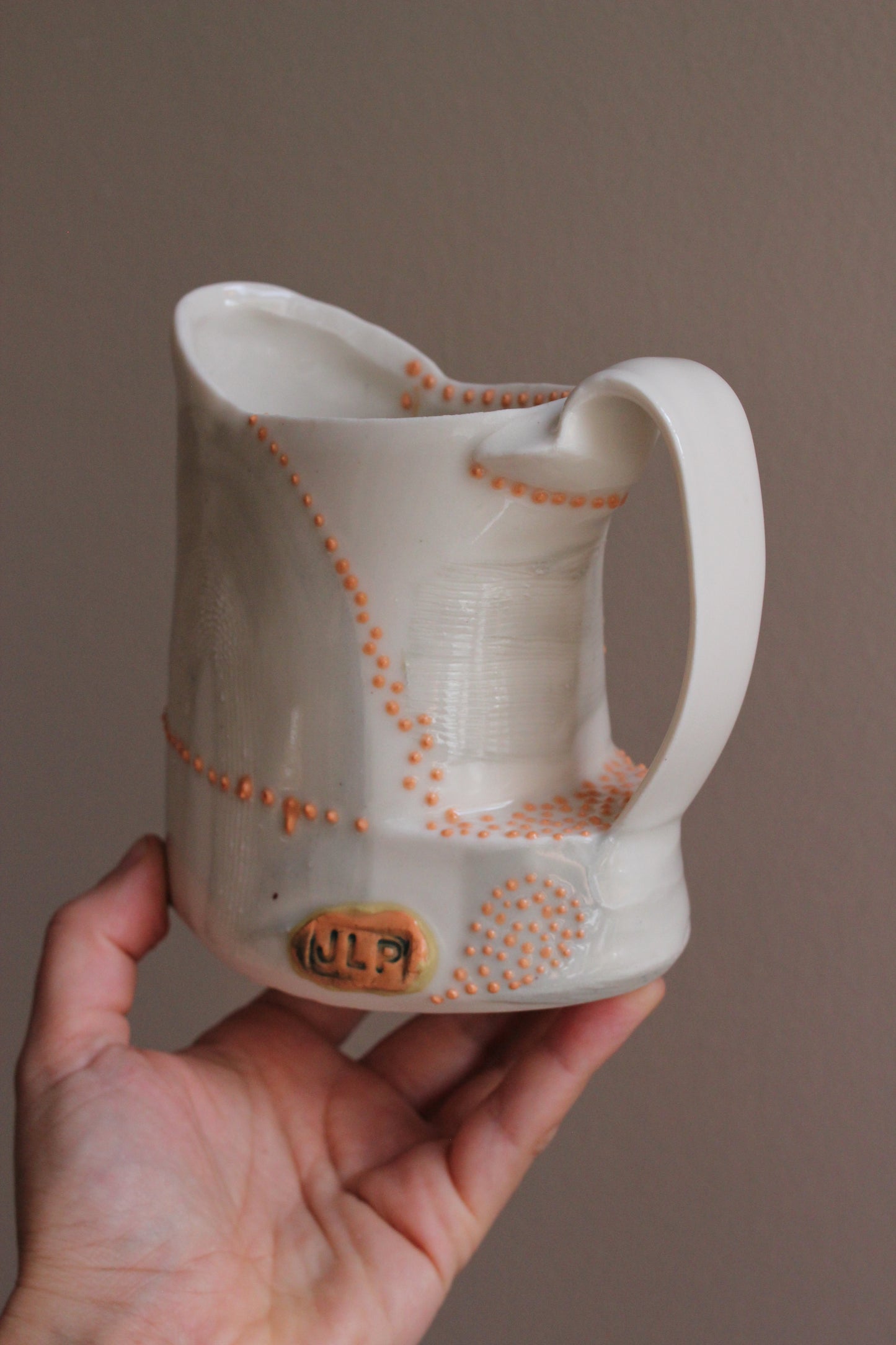 Pitcher with Gray and Orange Accents