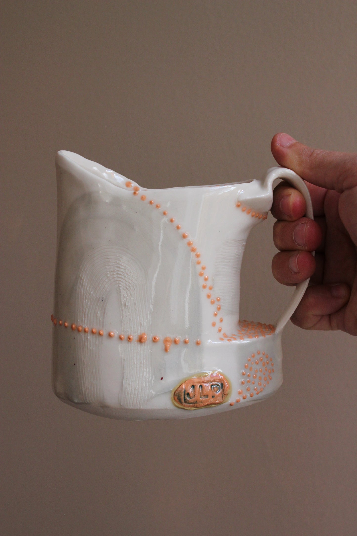 Pitcher with Gray and Orange Accents