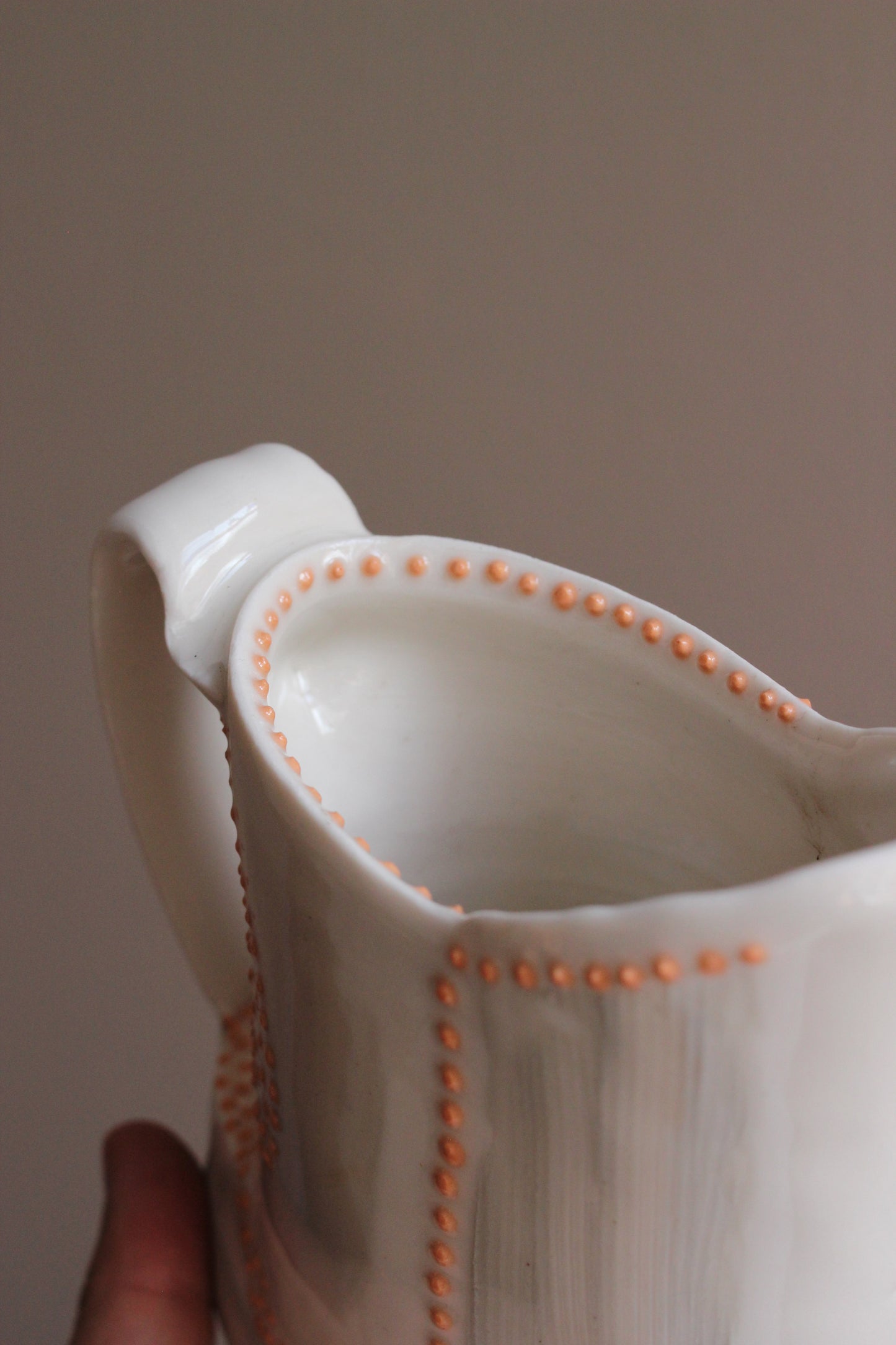 Pitcher with Gray and Orange Accents
