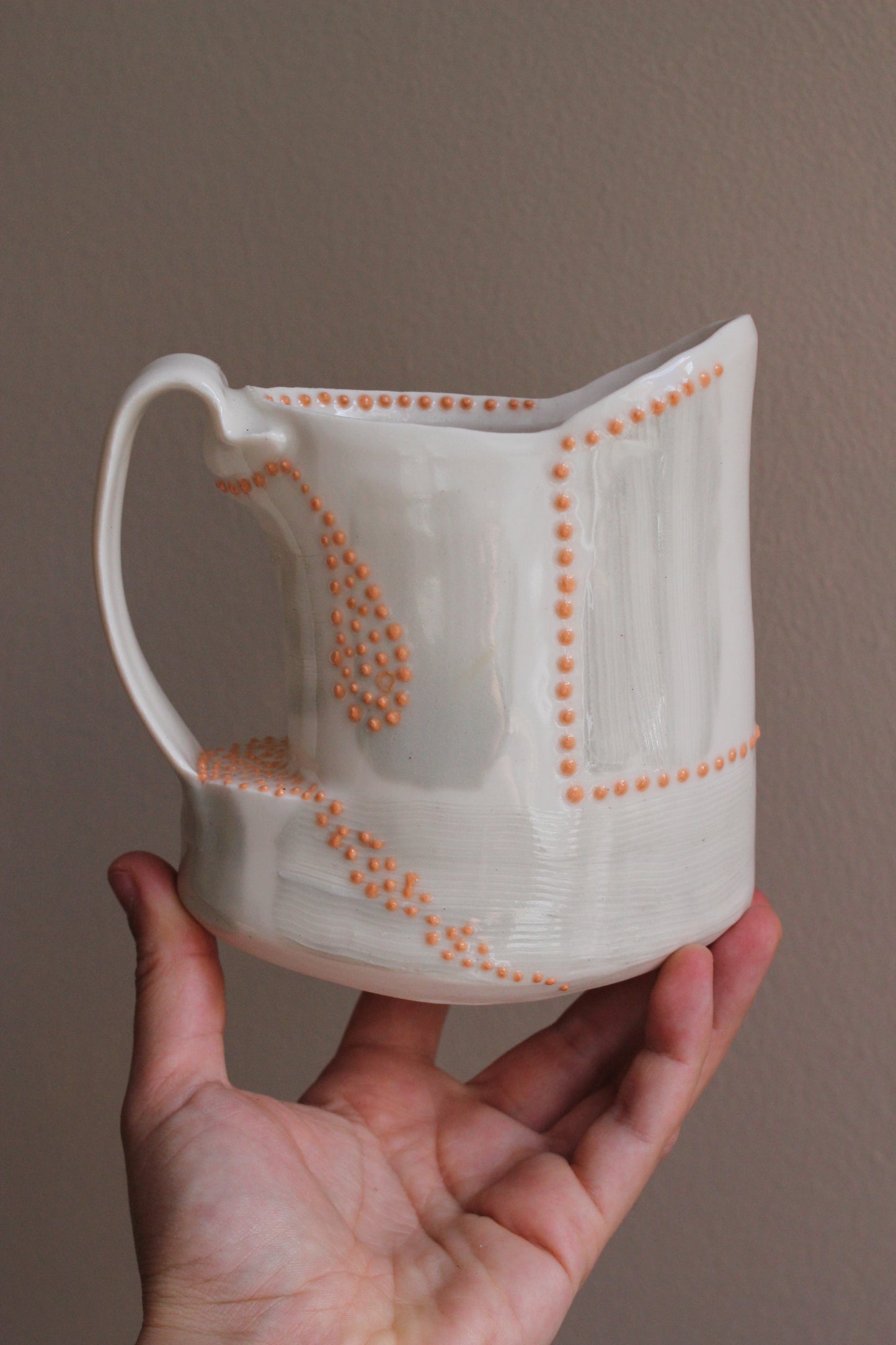 Pitcher with Gray and Orange Accents