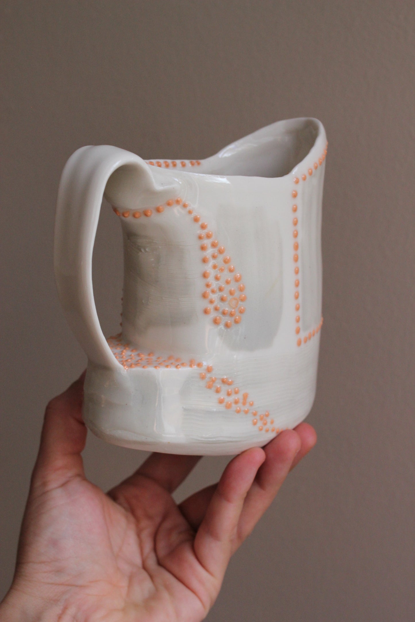 Pitcher with Gray and Orange Accents